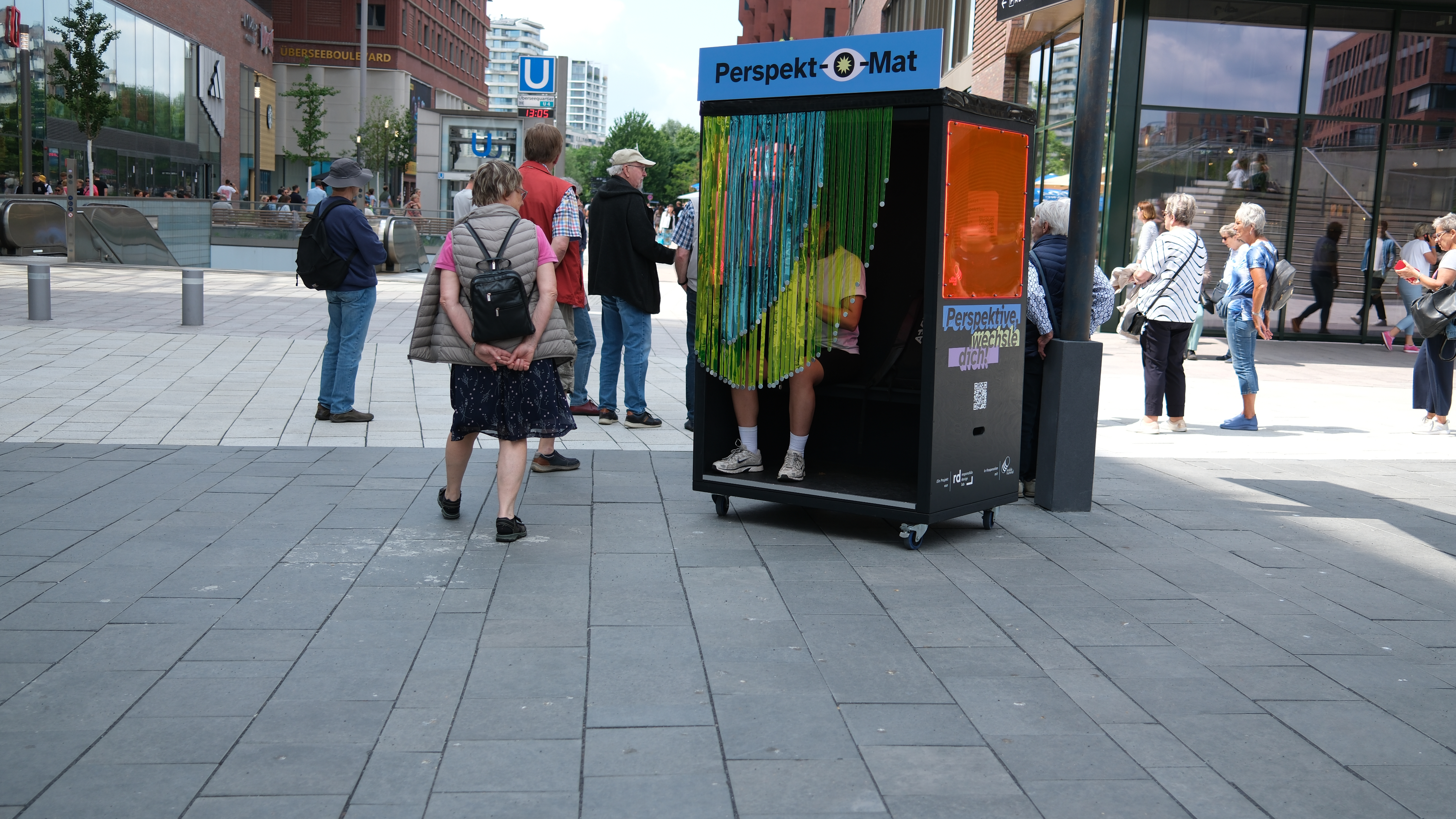 Photo of a man in a room using a tablet computer