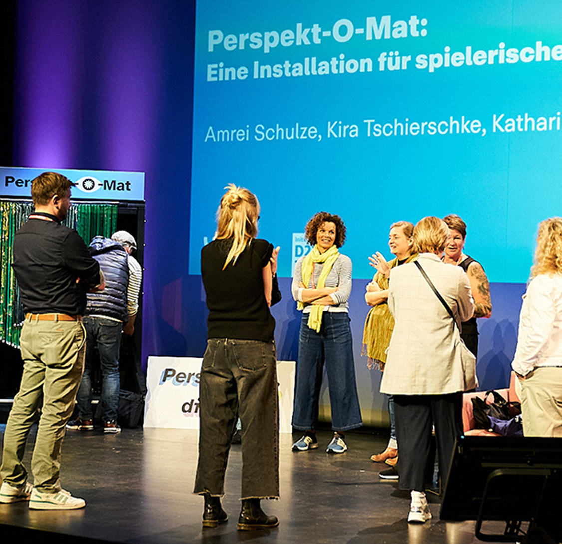 Photo of a man in a room using a tablet computer